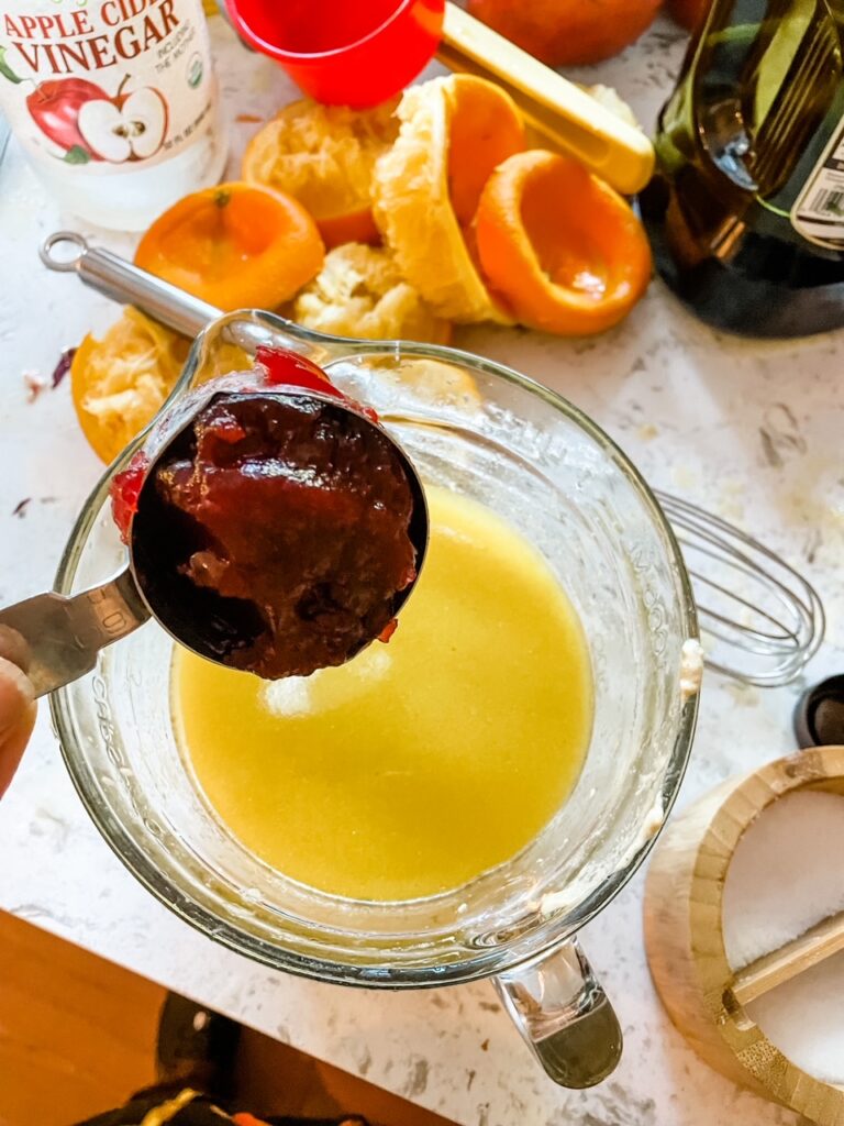 The vinaigrette being mixed together 