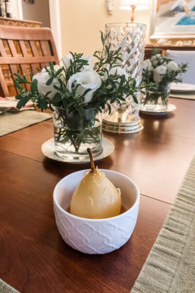 The finished Poached Pears with Marsala in a small ceramic bowl