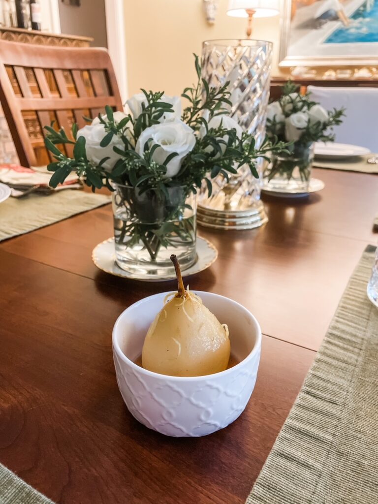 The finished Poached Pears with Marsala in a small ceramic bowl