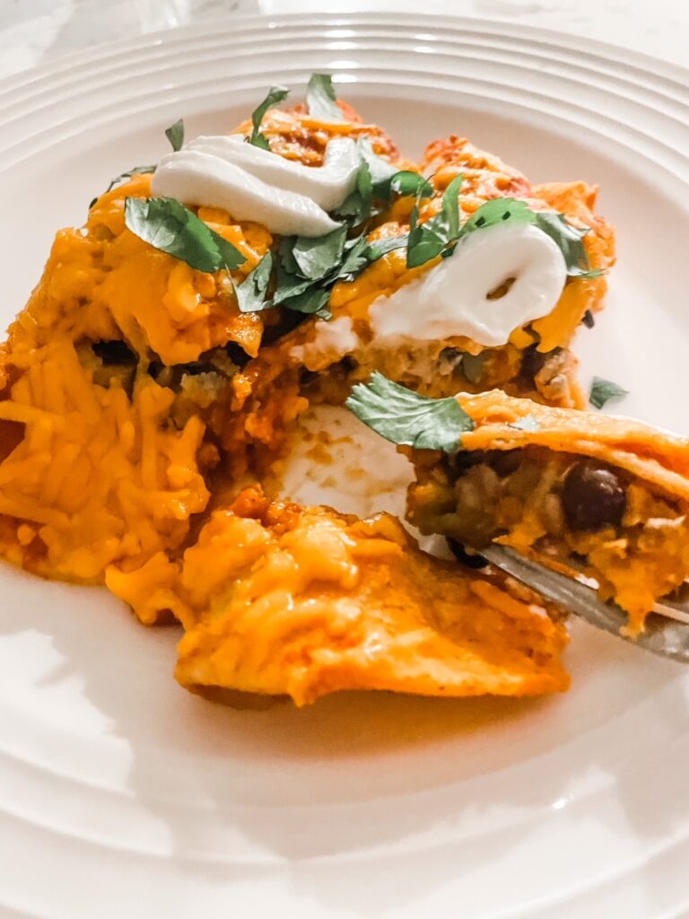 The Sweet Potato and Roasted Vegetable Enchiladas being eaten