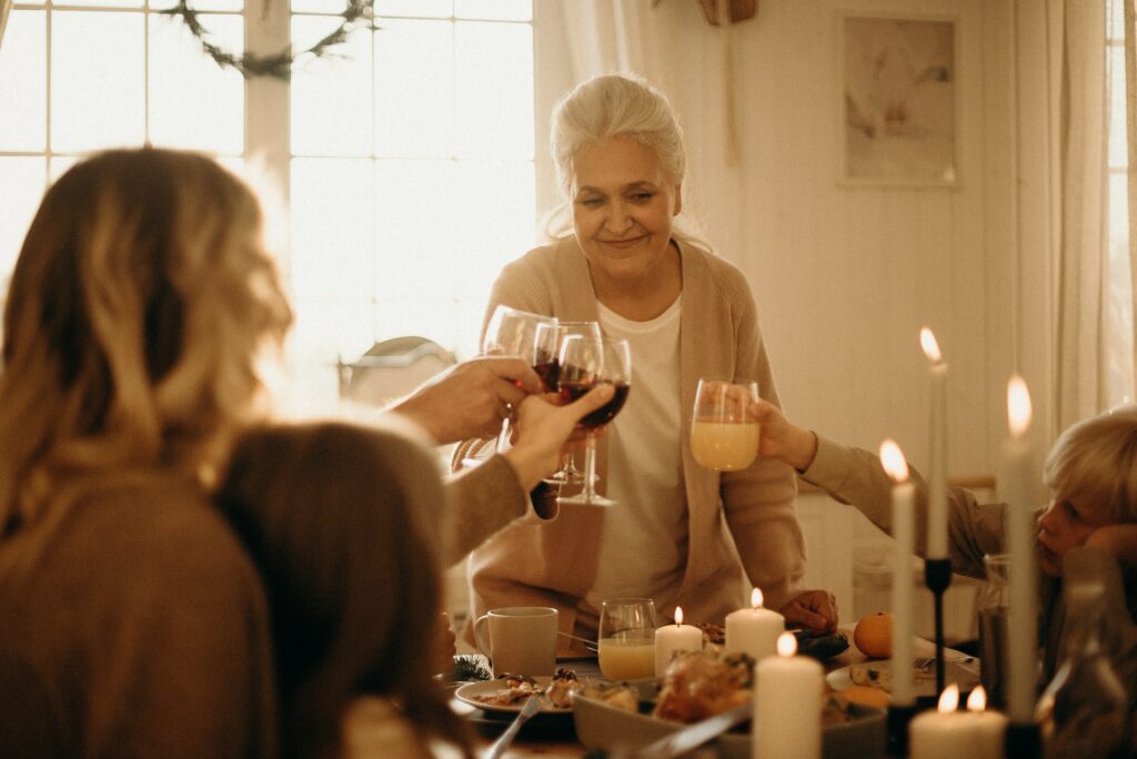 A woman being toasted by her family