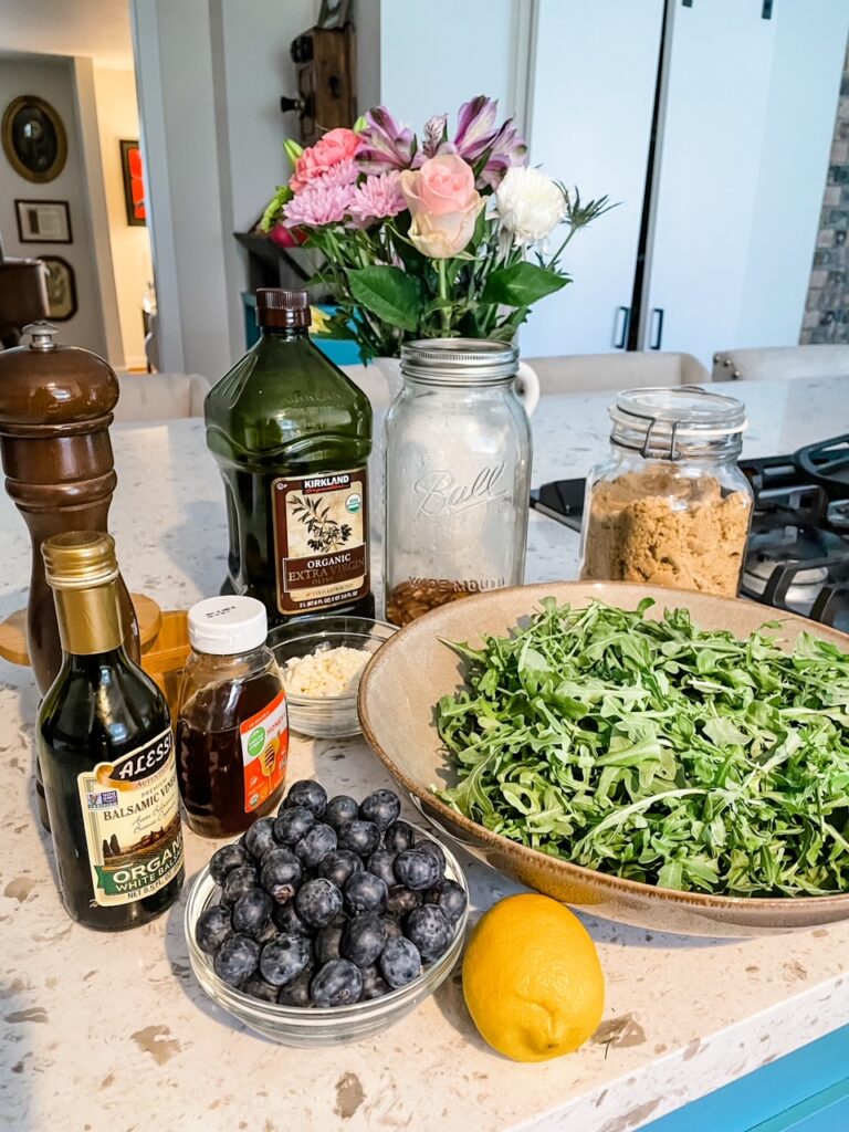 The ingredients for the salad and dressing laid out on a countertop