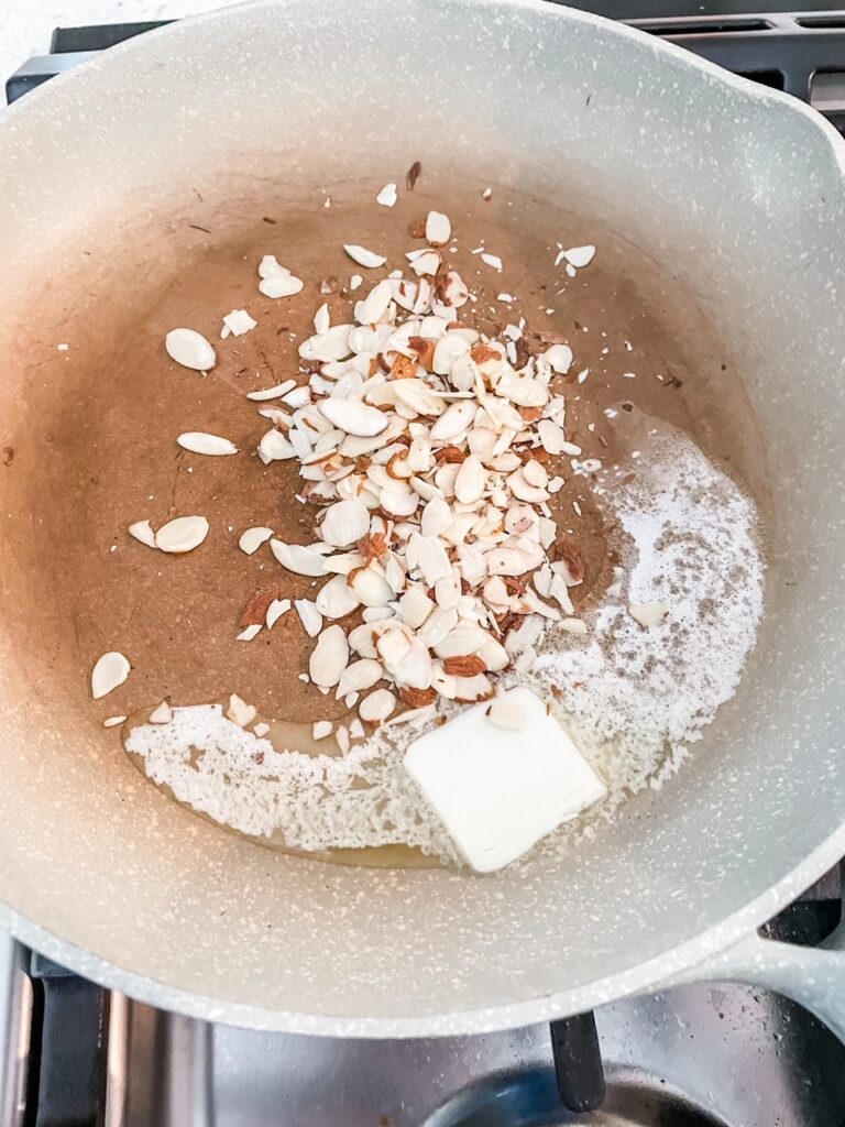 Sliced almonds toasting in butter