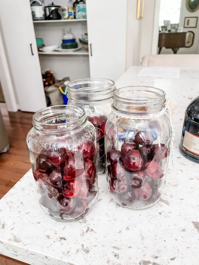 The jars with the cherries inserted