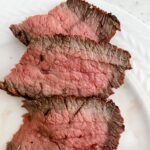 The finished and sliced marinated tri tip steak