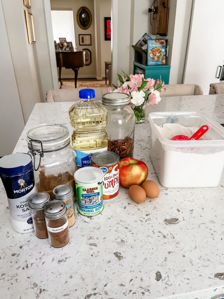 The ingredients for the Fall Pumpkin Apple Bread set out on a counter