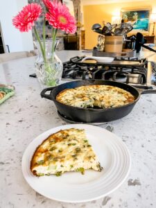 A slice of the finished Asparagus and Feta Veggie Frittata