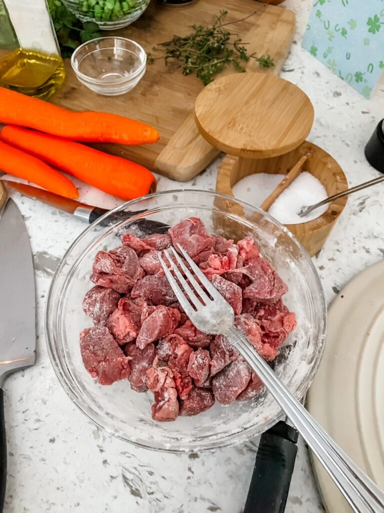 The lamb cut into small, 1-inch pieces
