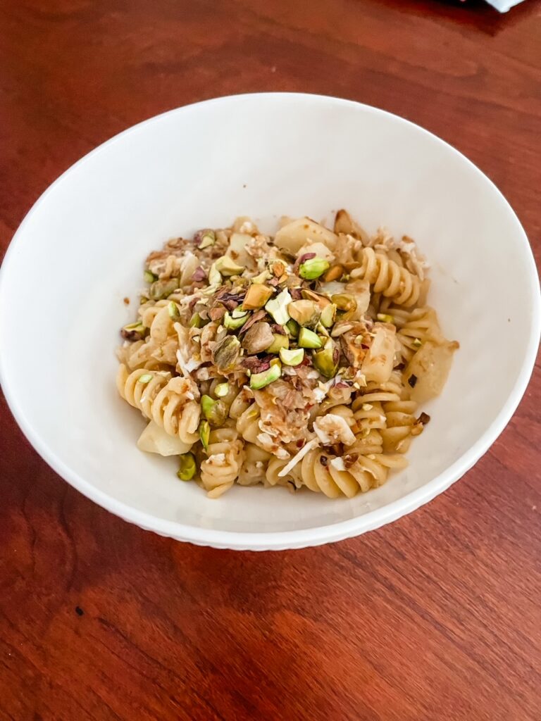 The Cheesy Cauliflower Pasta with Pistachios in a bowl