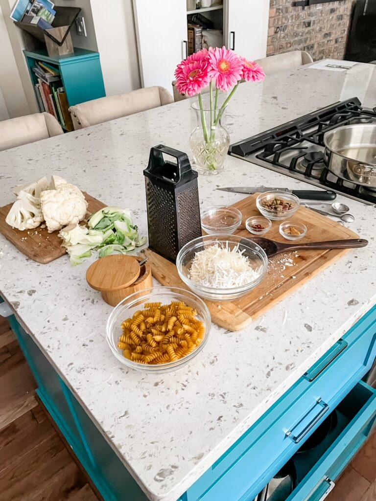 The ingredients for cauliflower pasta set out on a counter