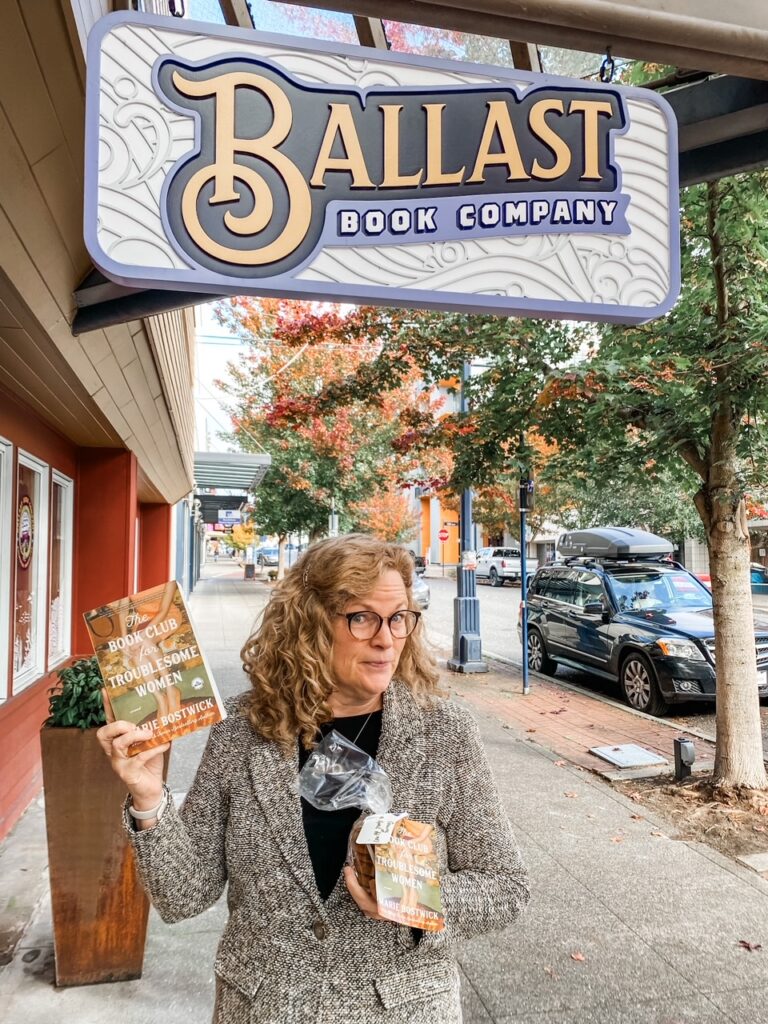 Marie visiting bookstores with a bag of fresh baked Make Ahead Chewy Molasses Cookies