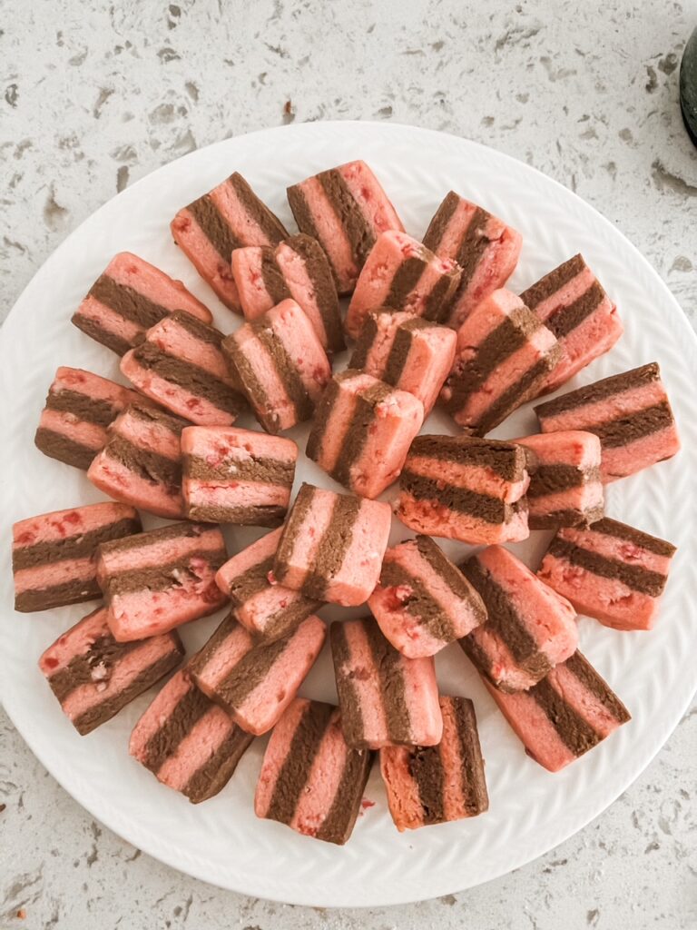 The finished Chocolate Peppermint Crunch Ribbon Cookies stacked on a plate