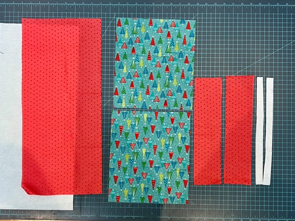 The cut out fabric and batting for the DIY Fabric Gift Bags