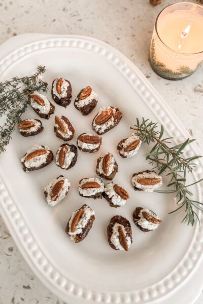 The platter of finished Stuffed Dates with Cheese and Herbs