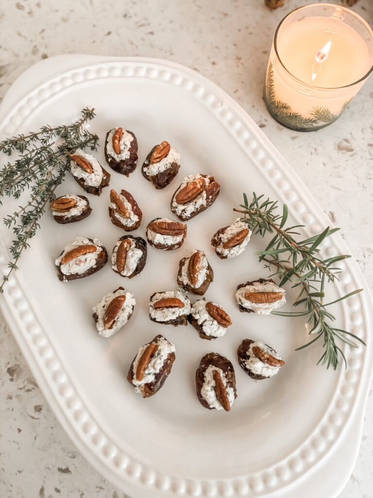 The platter of finished Stuffed Dates with Cheese and Herbs