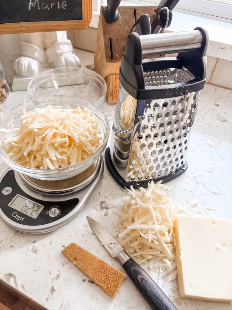 The cheese after being grated on the largest hole