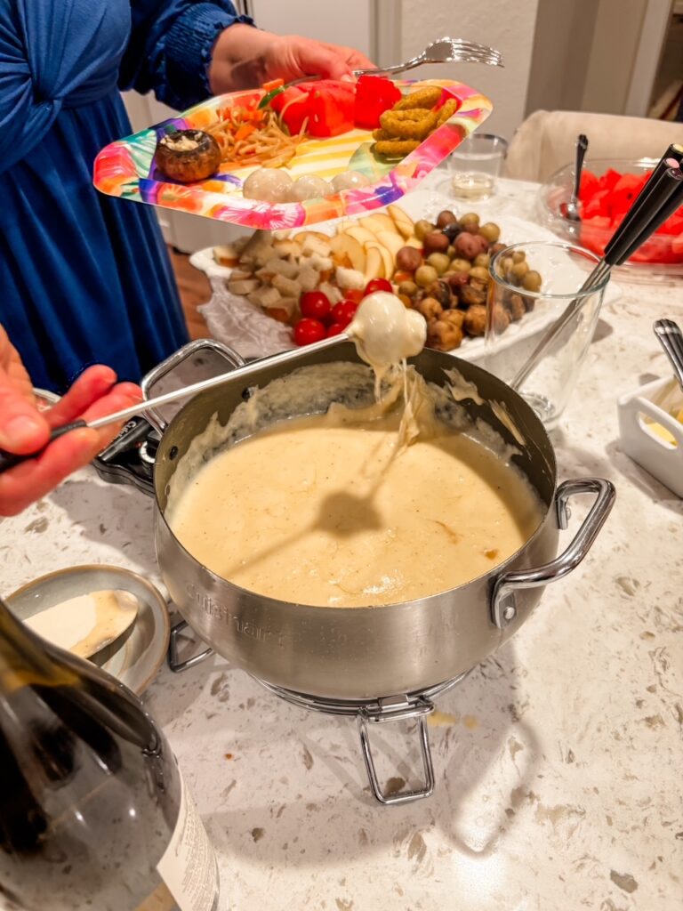 Marie's fondue being served at her bookclub