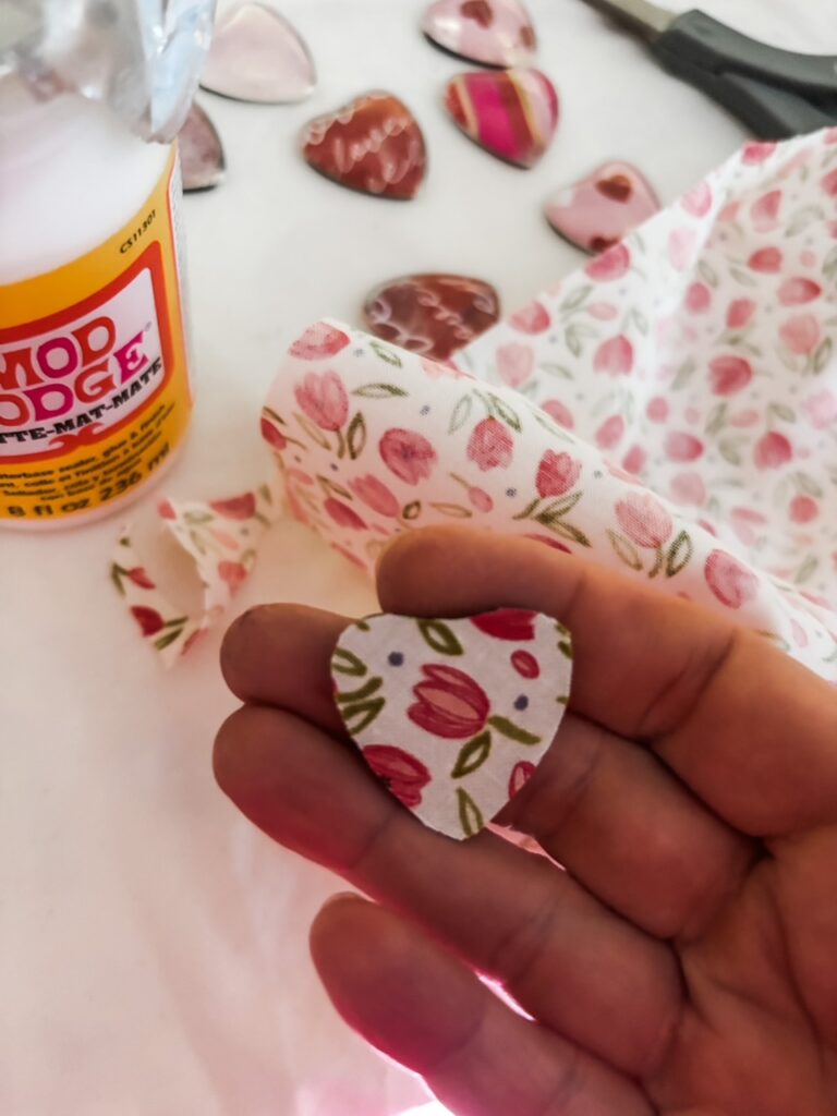 Marie holding one of the Valentine Heart Magnets