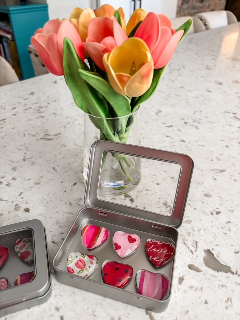 The finished Valentine Heart Magnets in a tin