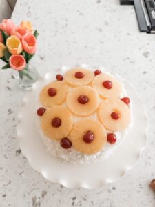 The finished and decorated Coconut Cake with Pineapple Filling