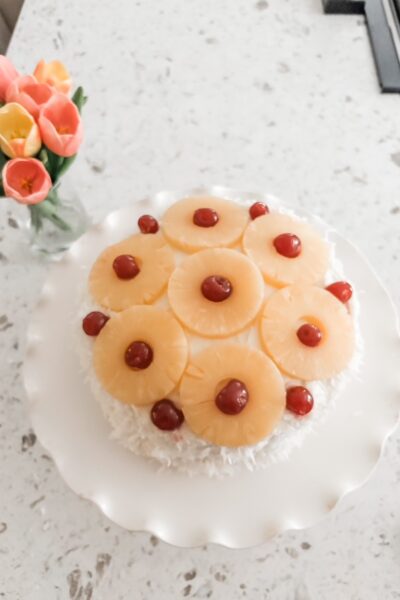 The finished and decorated Coconut Cake with Pineapple Filling