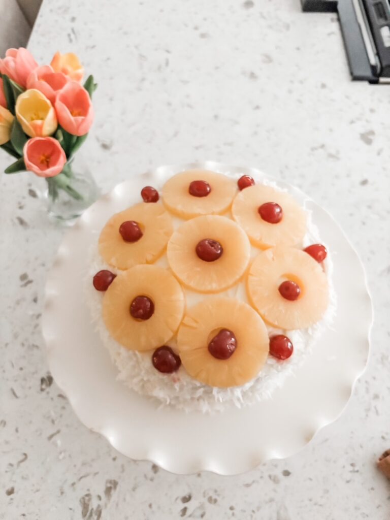 The finished and decorated Coconut Cake with Pineapple Filling