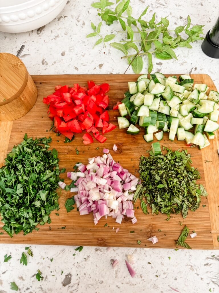 The chopped veggies and herbs