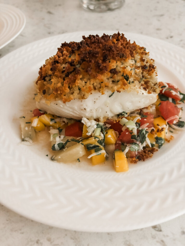 The finished Broiled Panko Halibut accompanied with a tropical salsa