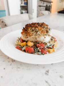The finished Broiled Panko Halibut accompanied with a tropical salsa