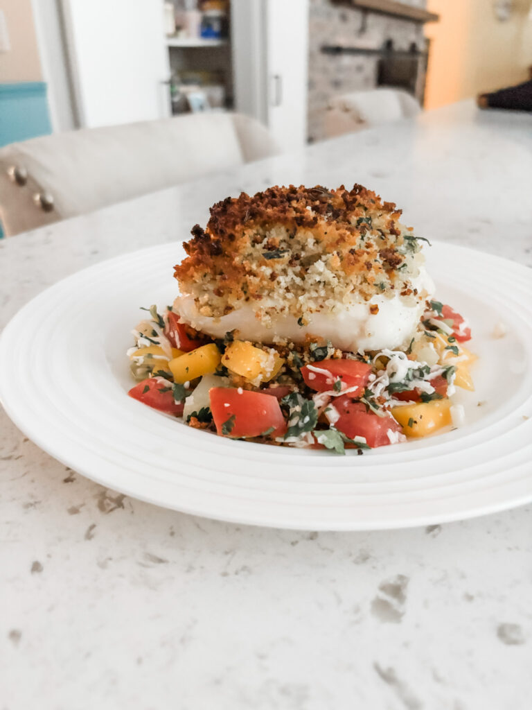 The finished Broiled Panko Halibut accompanied with a tropical salsa