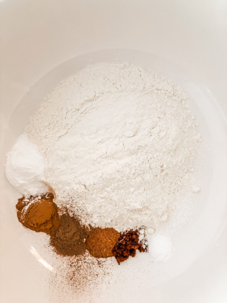 The flour and other dry ingredients in a bowl