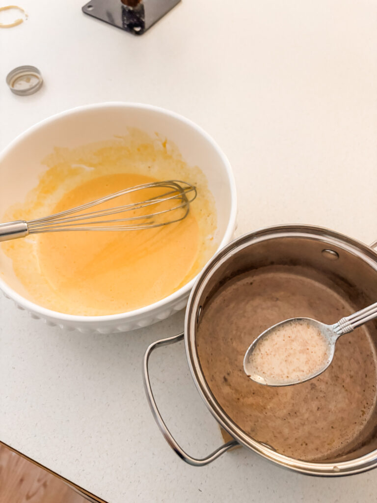 Tempering the egg yolk mixture