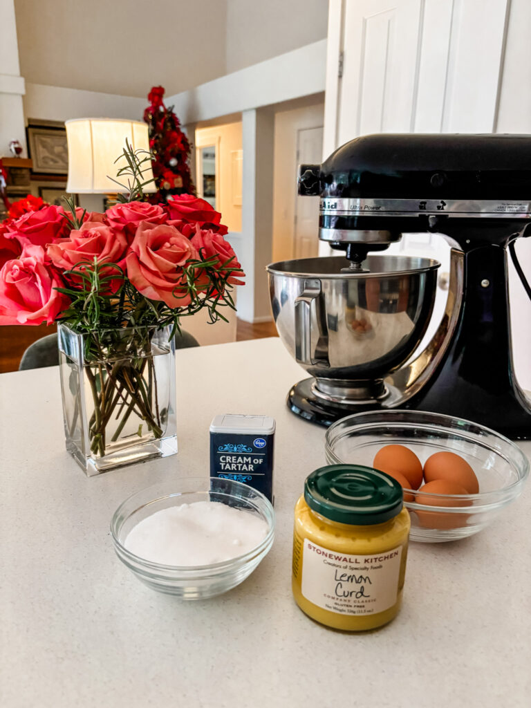The four ingredients for the recipe in front of the stand mixer