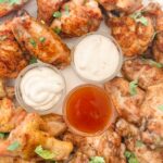 The finished Oven Baked Wings with accompanying dips