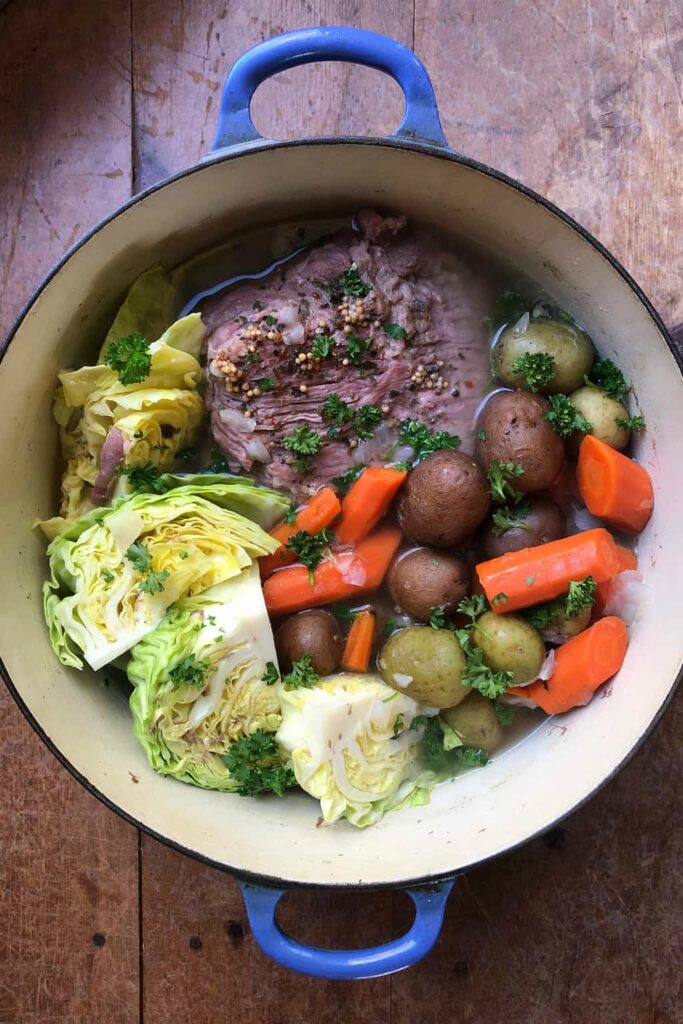 Corned Beef and vegetables stewing in a pot - one of the most known St. Patrick's Day recipes