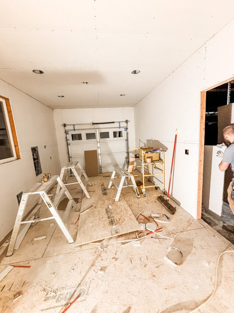 The walls in process of being finished to match the interior of the house