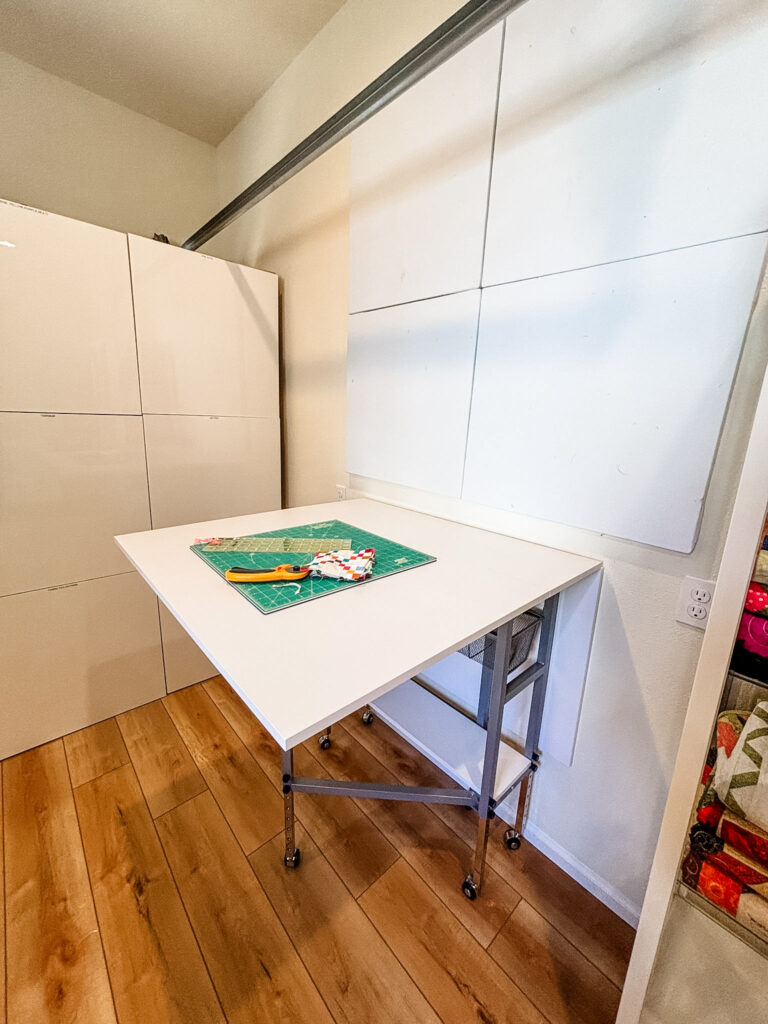 The drop leaf table that extends out from one of the walls