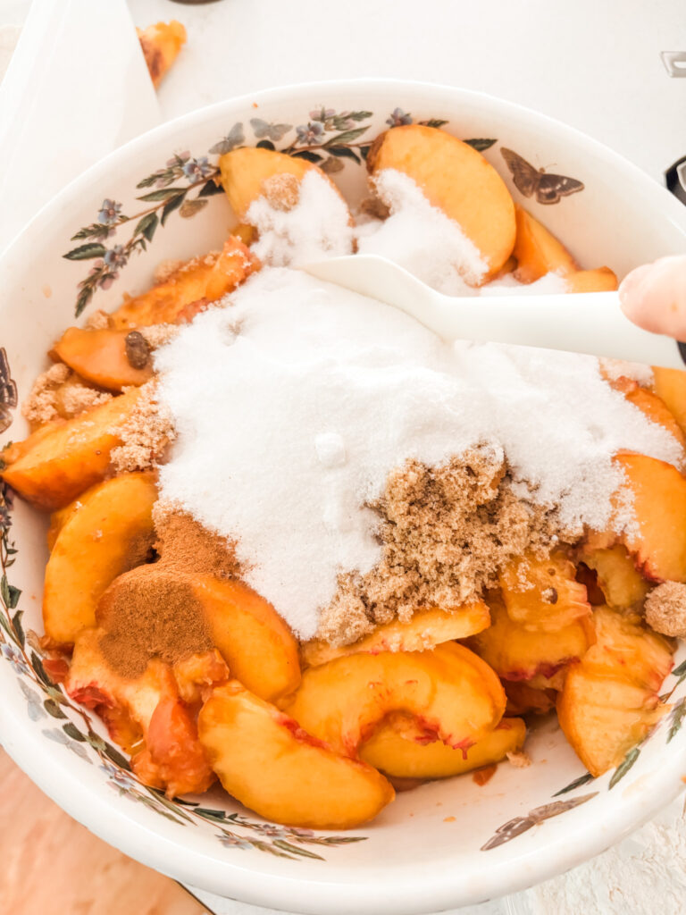 The peeled peaches with the dry ingredients